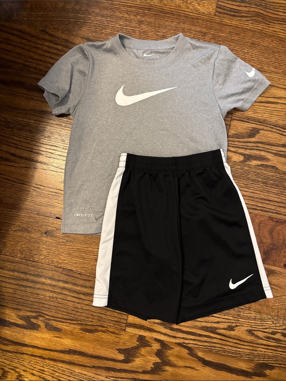 Nike Kids Gray T-Shirt and Black Shorts Athletic Set